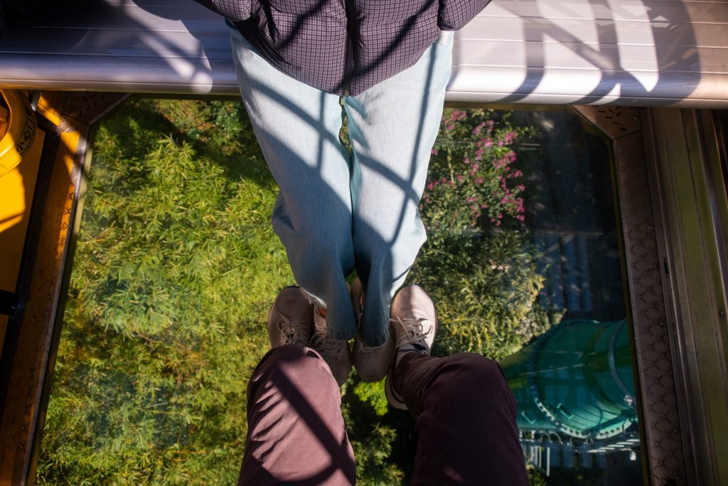 Couple riding a cablecar in China.
