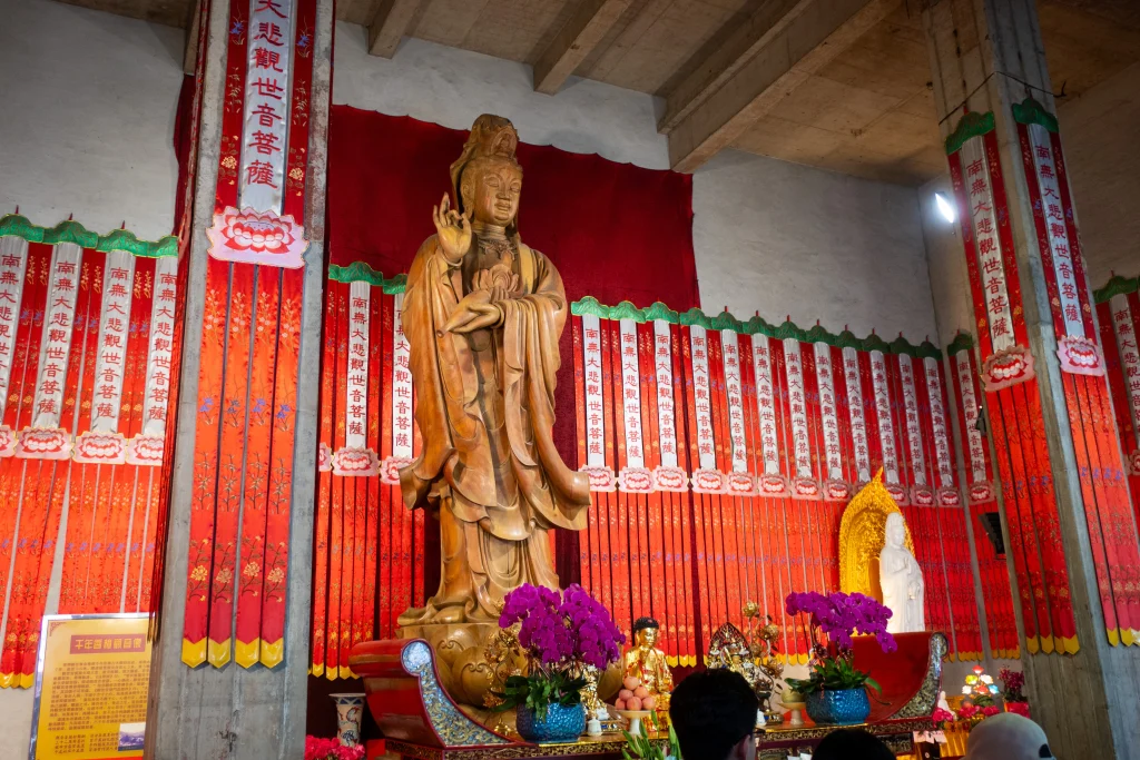 A carved wooden statue of a goddess at the Buddhist Jing'an Temple in Shanghai. 