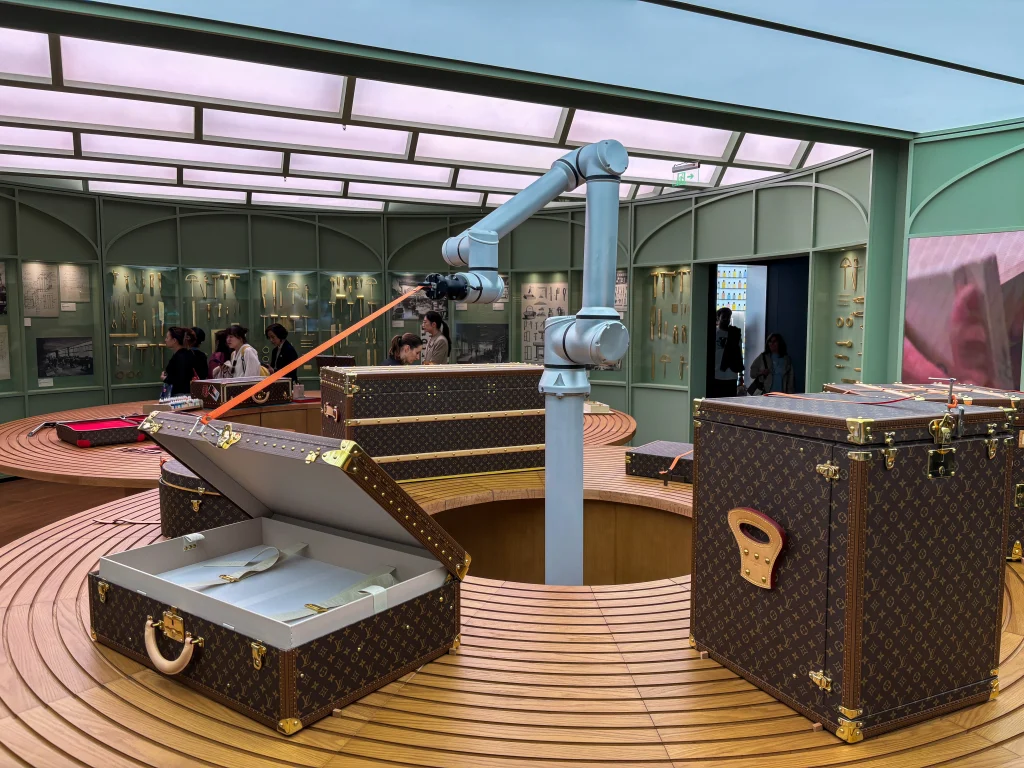 Louis Vuitton suitcases undergoing quality inspection at the Visionary Journeys exhibition in Shanghai.